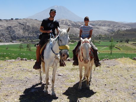 horseback riding in the countryside of Arequipa with the Misti Volcano in the background